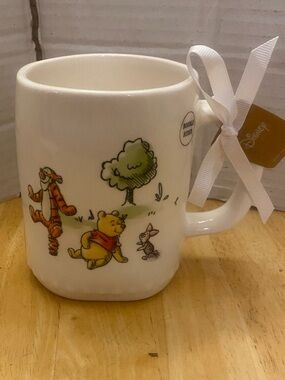 Rae Dunn Disney Winnie the Pooh mug says Life is full of ups and downs NWT